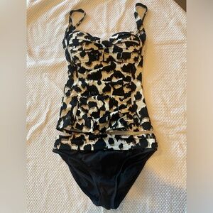 La Blanca animal print tankini top and bottoms.